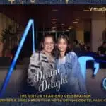 Employee smiling in casual denim attire during Virtua's year-end celebration