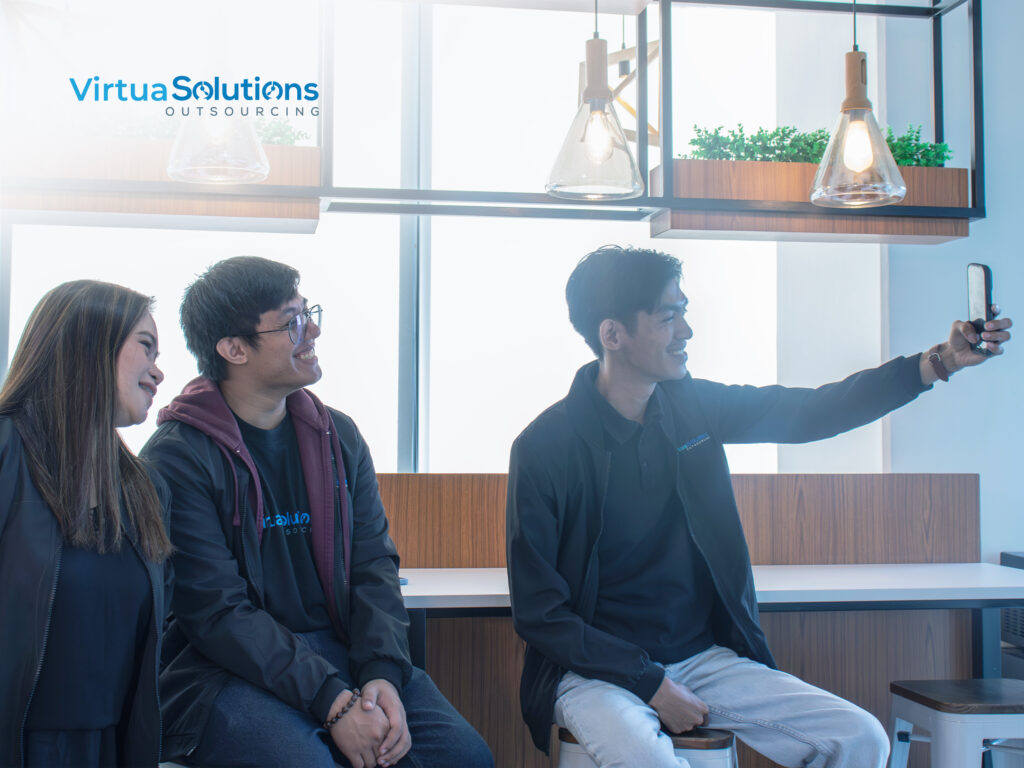 Three teammates taking office selfie